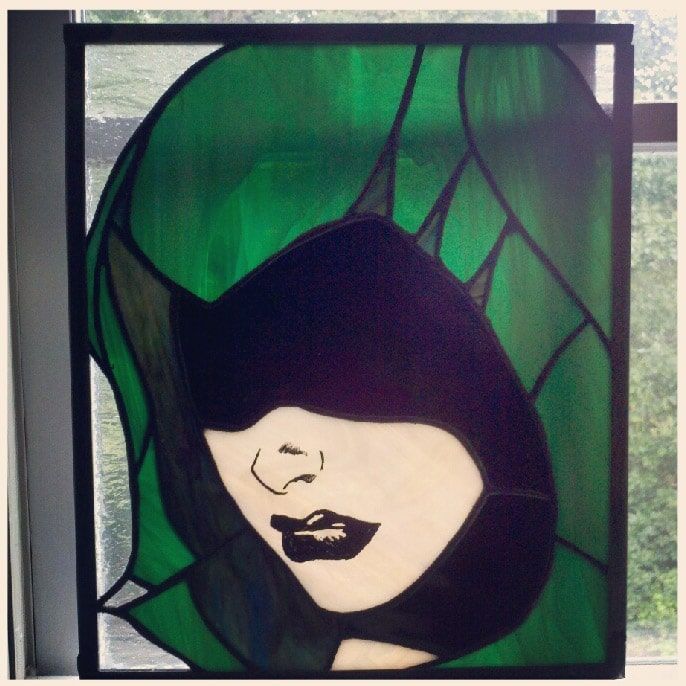 Cloaked Woman, painted stained glass